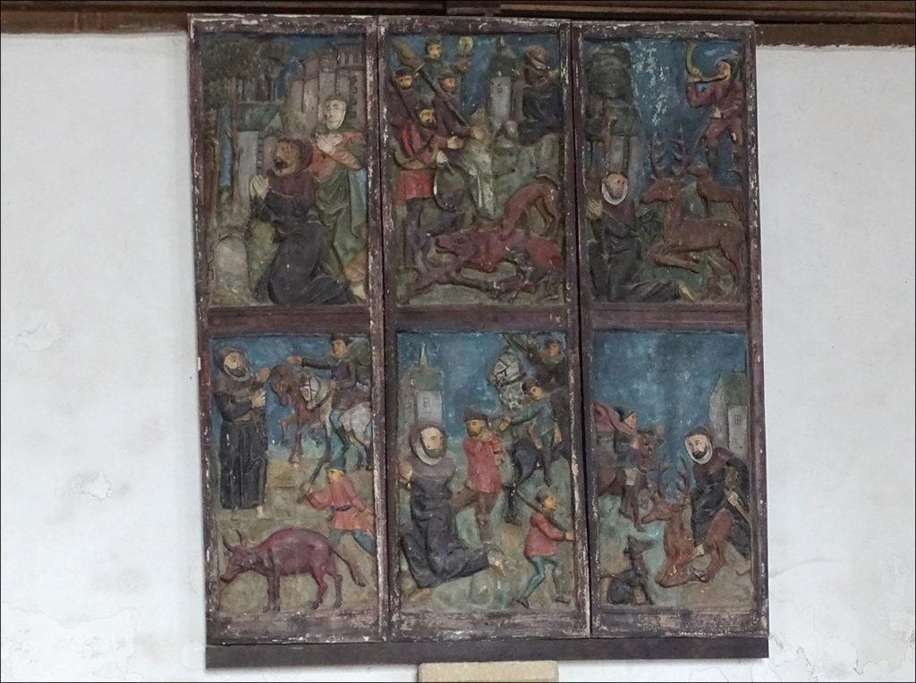 Panneaux relatant la vie de saint Édern dans l'église de Lannédern.