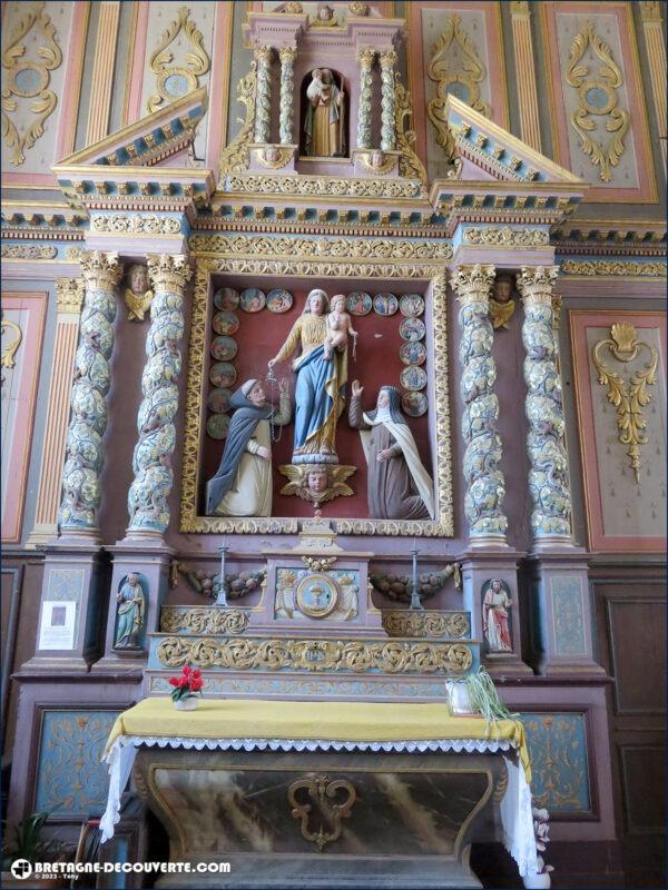 Le retable du rosaire dans l'église de Brasparts.