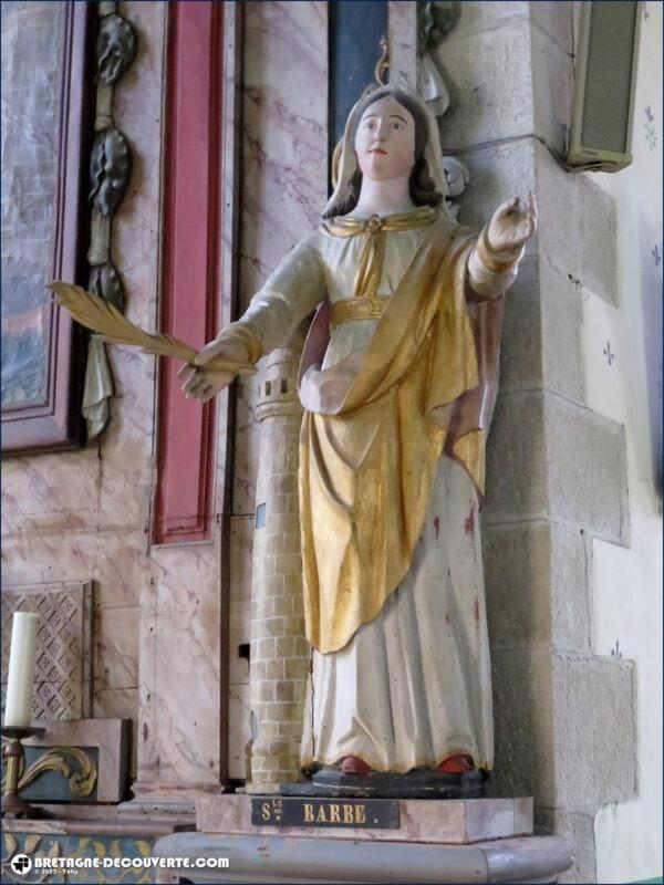 La statue de sainte Barbe dans l'église de Guerlesquin.