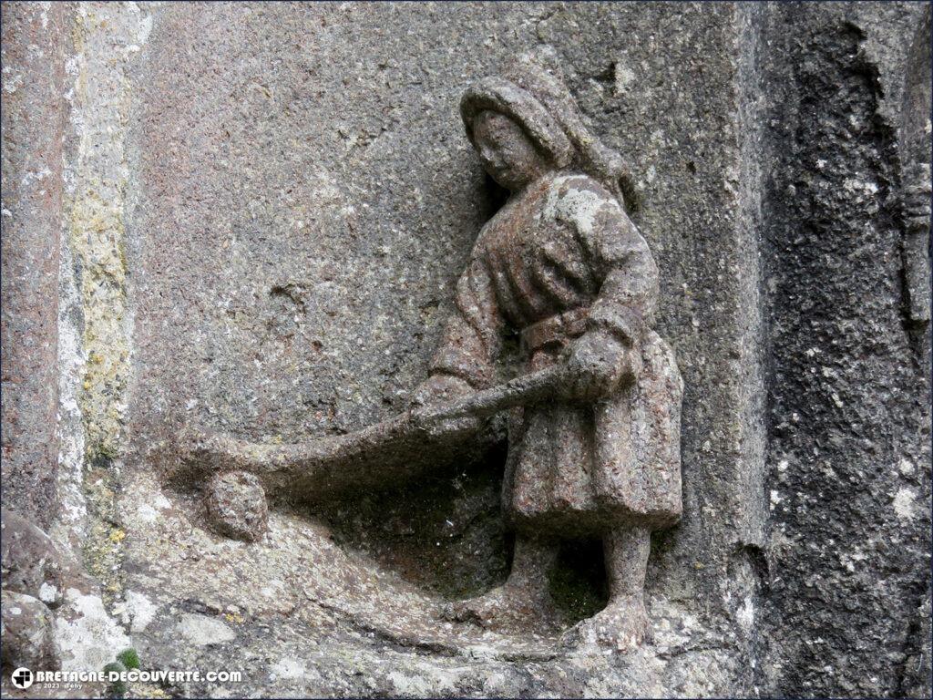 Joueuse de crosse dans l'église Saint-Salomon de La Martyre.